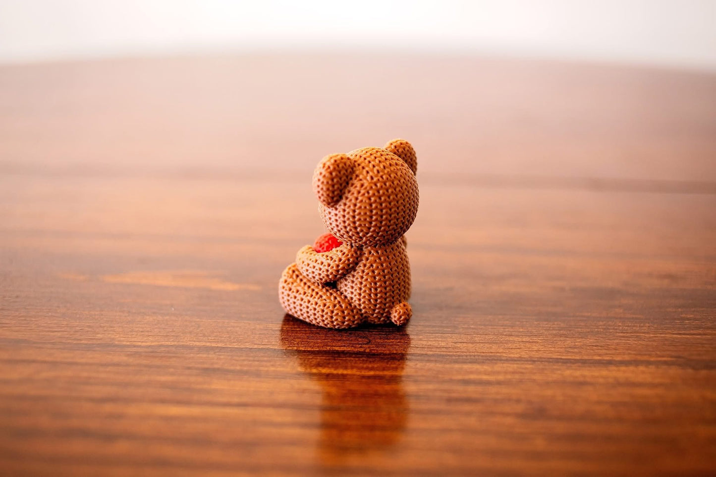 Hand-Knitted Teddy Bear with Heart Figurine