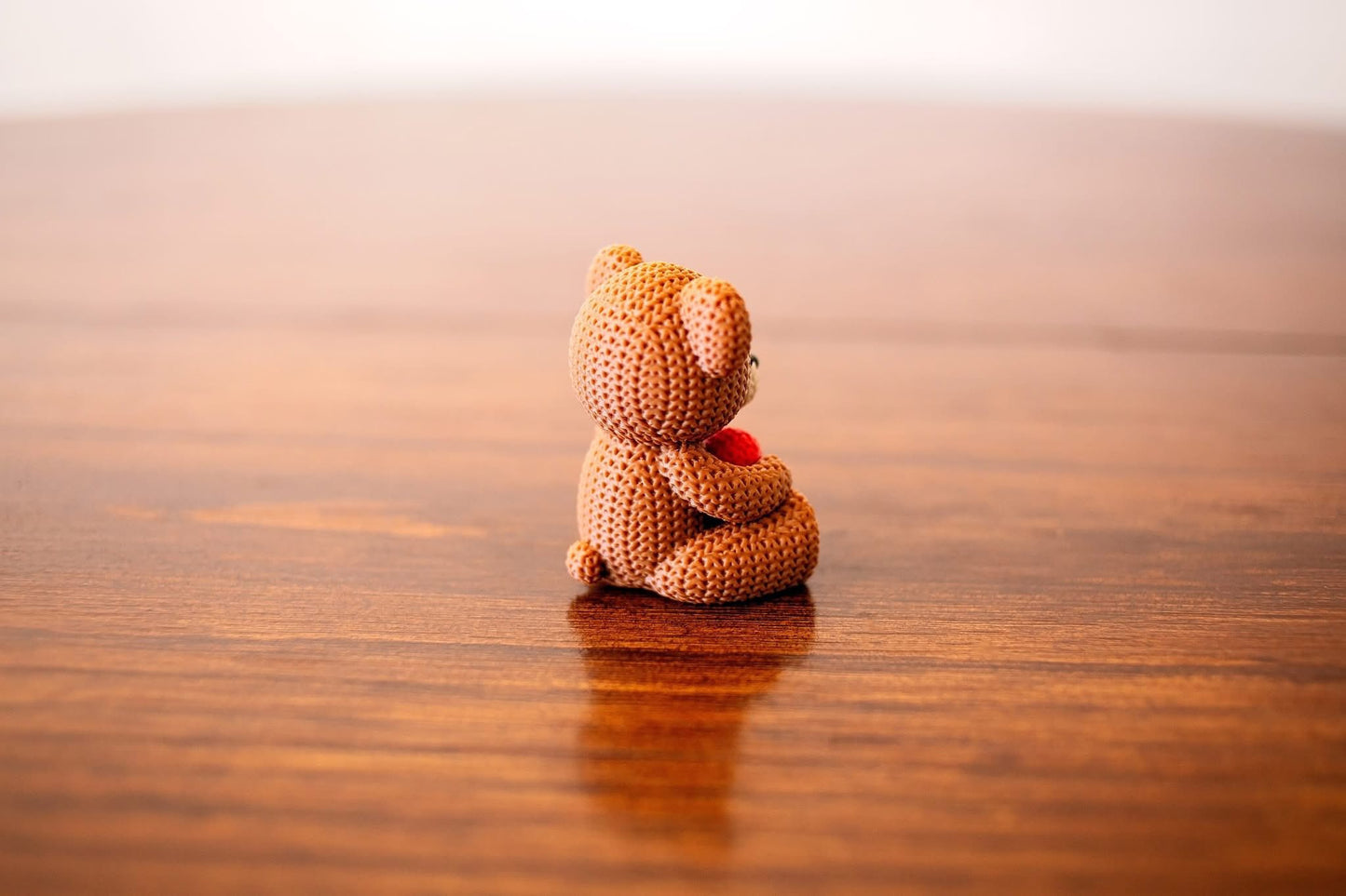 Hand-Knitted Teddy Bear with Heart Figurine