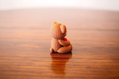 Hand-Knitted Teddy Bear with Heart Figurine