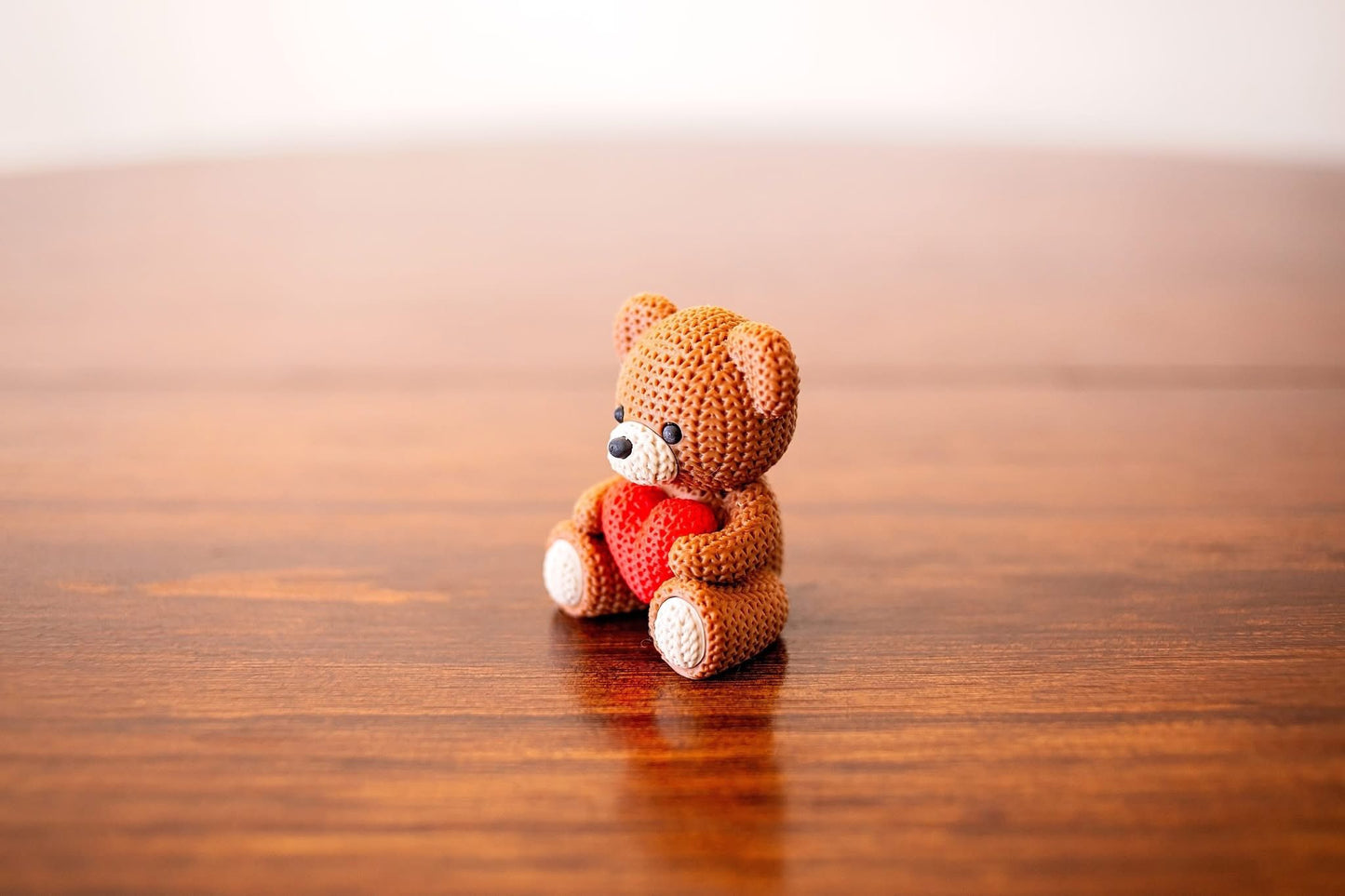 Hand-Knitted Teddy Bear with Heart Figurine