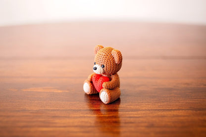 Hand-Knitted Teddy Bear with Heart Figurine